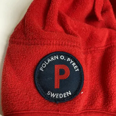 Mössa (Vindfleece med förstärkt vindstopp över öronen ) från Polarn O. Pyret Polyester thumbnail 3