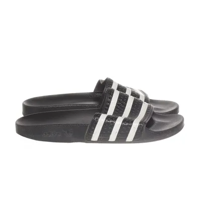 Slip-ins (Svart, Vit) från Adidas
