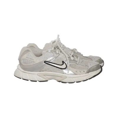 Baskets (T-Lite) de Nike