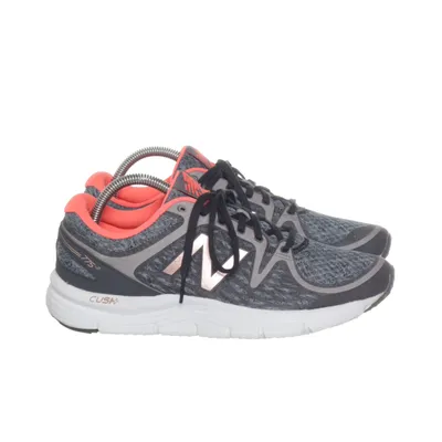 Running shoes (Gray, Pink, Blue) from New Balance