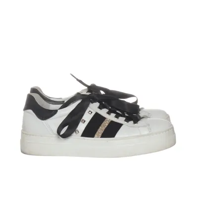 Sneakers (White, Black, Gold) from Nero Giardini