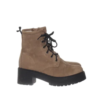 Laced boots (1951) from Marquis
