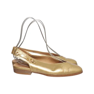 Klackskor (Guldfärgad) från Pertti Palmroth