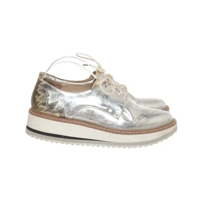 Sneakers (Silver) from Bruno Zaragoza