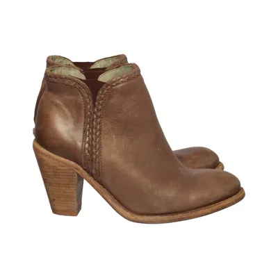 Heeled boots (Brown) from Maruti