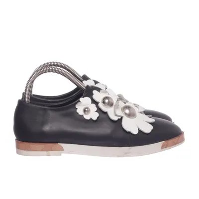 Slip-ons (Svart, Vit) från Miista