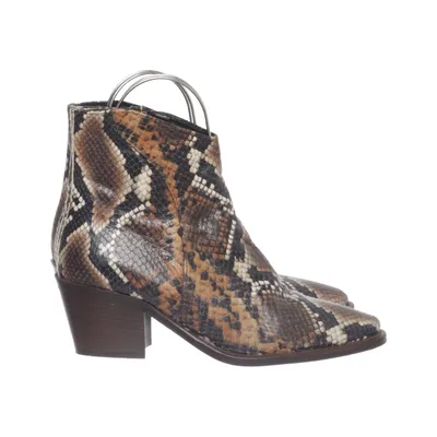 Laarzen met hak (Bruin, Zwart, Wit) van Donna Carolina