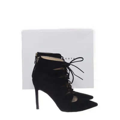 Heeled boots (Black, White) from Roberto Festa