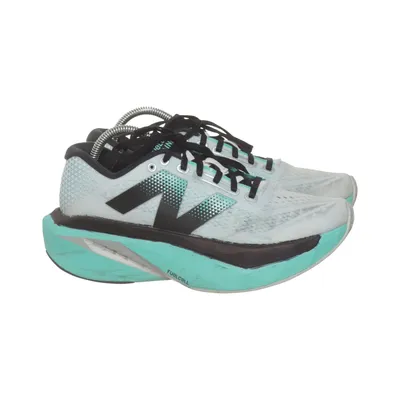 Running shoes (White, Black, Turquoise) from New Balance