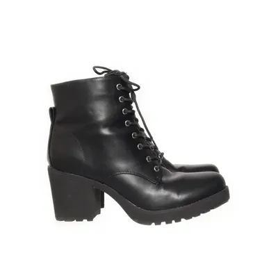 Heeled boots (Black) from About You
