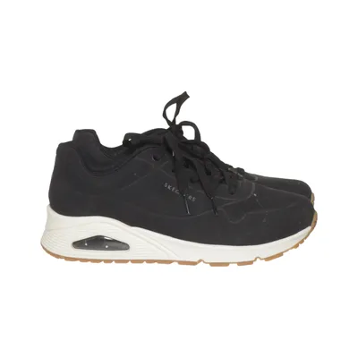 Trainers (Black, White, Brown) from Skechers