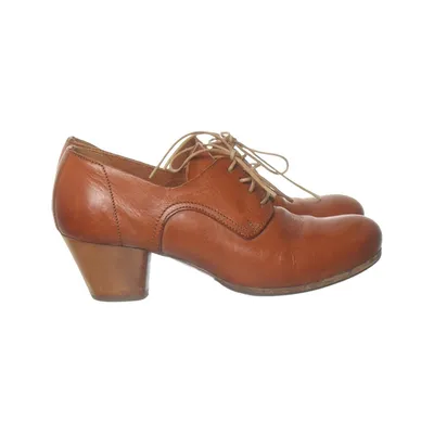 Heeled boots (Brown) from Moma