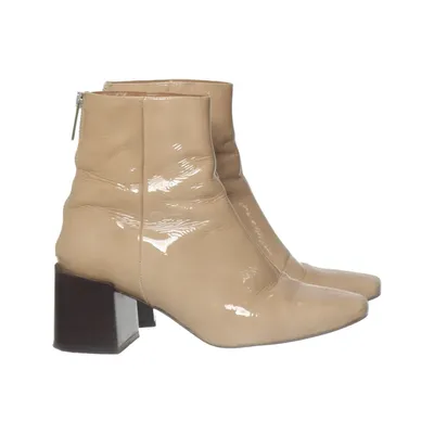 Bottes à talons (Beige) de Flattered Studio