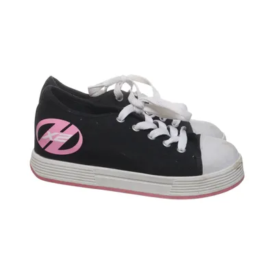 Chaussures à roulettes (Noir, Blanc, Rose) de Heelys