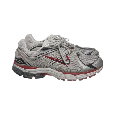 Running shoes (Gray, Red, Black) from Nike Air