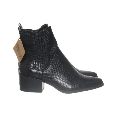 Heeled boots (Black) from Remix