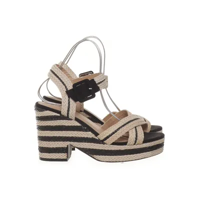 Clogs (Beige, Black) from JustFab