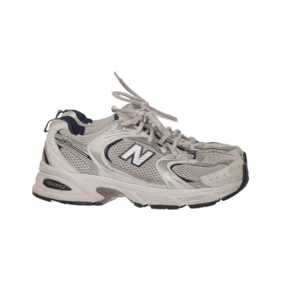 Running shoes (White, Silver, Blue) from New Balance