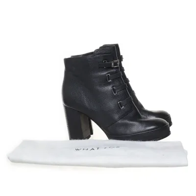 Heeled boots (Black) from What For
