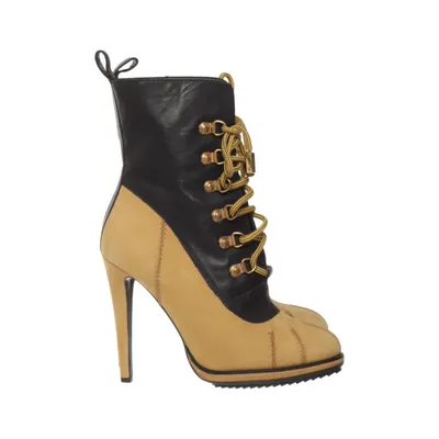 Stövletter (Svart, Beige) från H&M x Moschino Skinn