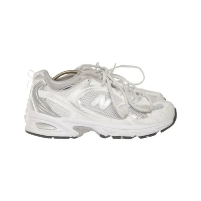 Running shoes (White, Silver, Gray) from New Balance