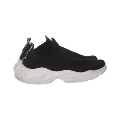 Slip-ons (Svart, Vit) från Amin