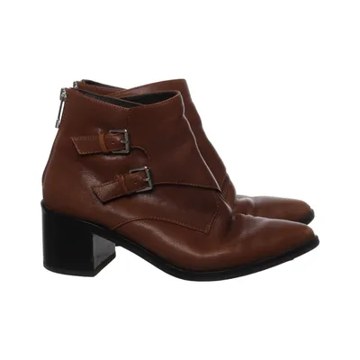 Heeled boots (Brown) from What For