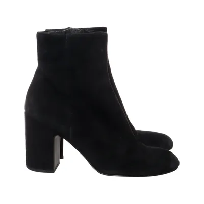 Heeled boots (Black) from What For