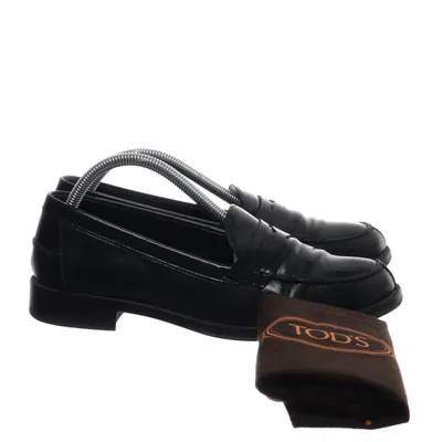 Loafers (TOD’s Leather patent penny loafers) from Tod's Leather