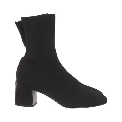 Heeled boots (Black) from What For