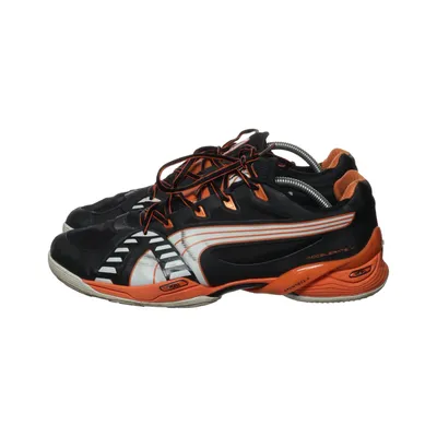 Running shoes (Black, Orange, White) from Puma