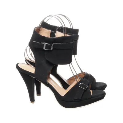 Mules (Noir) de Andrea Conti