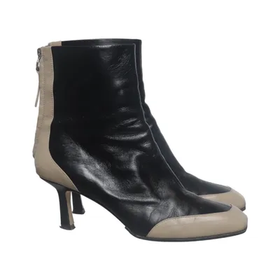 Heeled boots (Black, Beige) from Aeyde