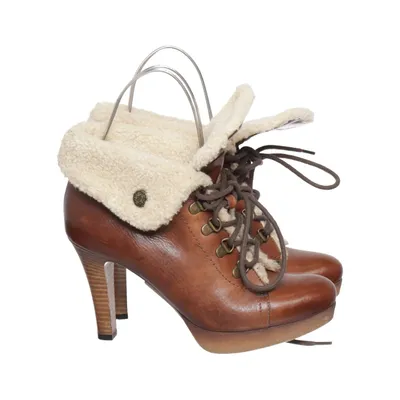 Heeled boots (Brown) from YKX & CO