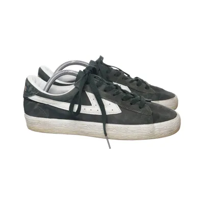 Sneakers (Black, White) from Warrior