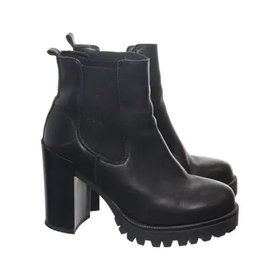 Heeled boots (Black) from Remix