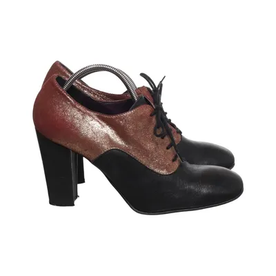 Heeled boots (Black, Red, Gold) from Chicas