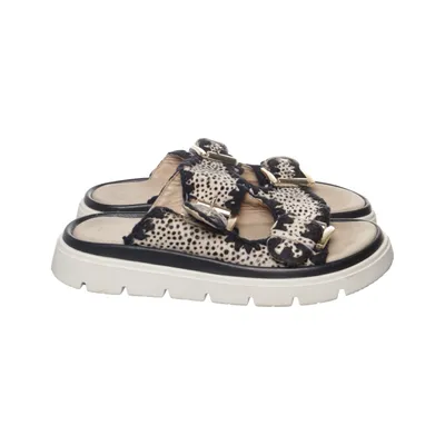 Slip-ins (Beige, Black, Multicolored) from Maruti