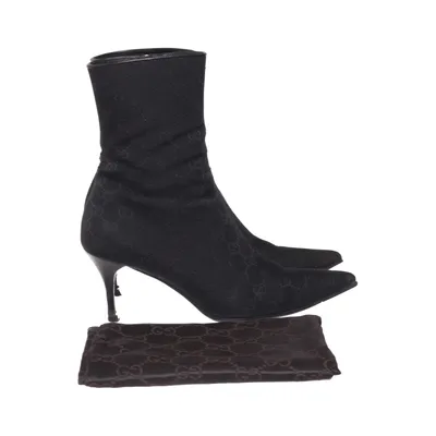 Heeled boots (Black) from Gucci