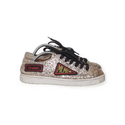 Sneakers (Gold) from Miu Miu
