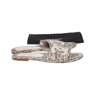 Slip-ins (Beige, Black) from Chanel