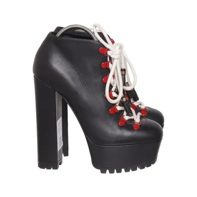 Heeled boots (Black) from Gucci