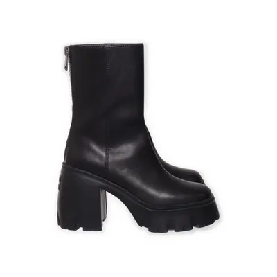 Heeled boots (Black) from Miu Miu