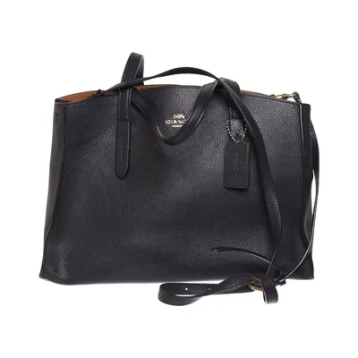 Handväska (Charlie Carryall) från Coach Skinn
