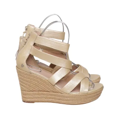 Kilklackar (Raquel Metallic Platform) från UGG Skinn