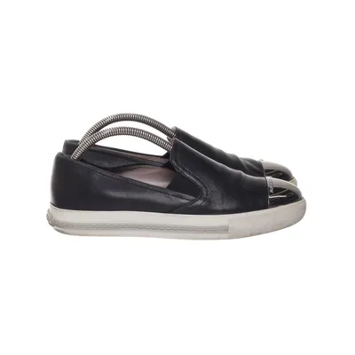 Slip-ons (Svart) från Miu Miu Skinn