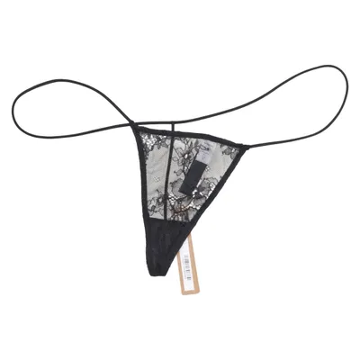 Stringtrosor (Ultra Fine Lace Micro Thong) från Skims Bomull, Elastan, Polyamid