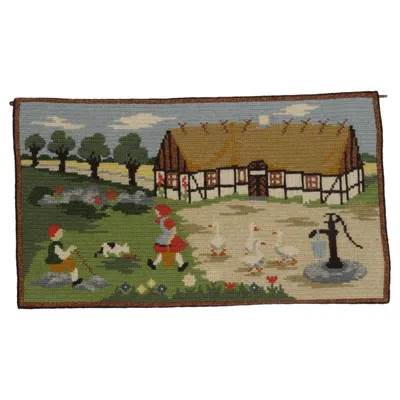 Vægtæppe (tvistsöm tvist broderi vepa traditionella skånska hus och gäss) fra Handbroderi