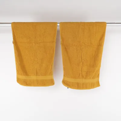 Badhanddoek (Geel) van Hema Katoen
