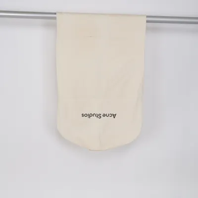 Resegarderob (Beige, Gul) från Acne Studios
